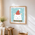 Cute polar bear with santa hat cross stitch artwork displayed on wall as home decor