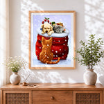 Finished cute puppy and kitten in a christmas santa sack cross stitch artwork displayed