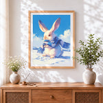 Finished cute rabbit in a blue winter scarf cross stitch artwork displayed