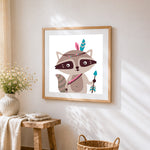 Cute raccoon with feather headdress cross stitch artwork displayed on wall as home decor