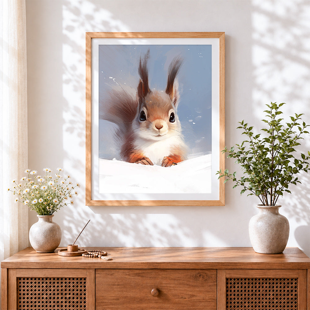 Finished cute red squirrel in the snow cross stitch artwork displayed
