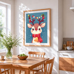 Cute reindeer with festive antlers cross stitch artwork displayed on wall as home decor