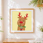 Finished cute reindeer with hot chocolate cross stitch artwork displayed