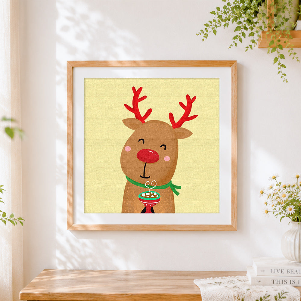 Finished cute reindeer with hot chocolate cross stitch artwork displayed