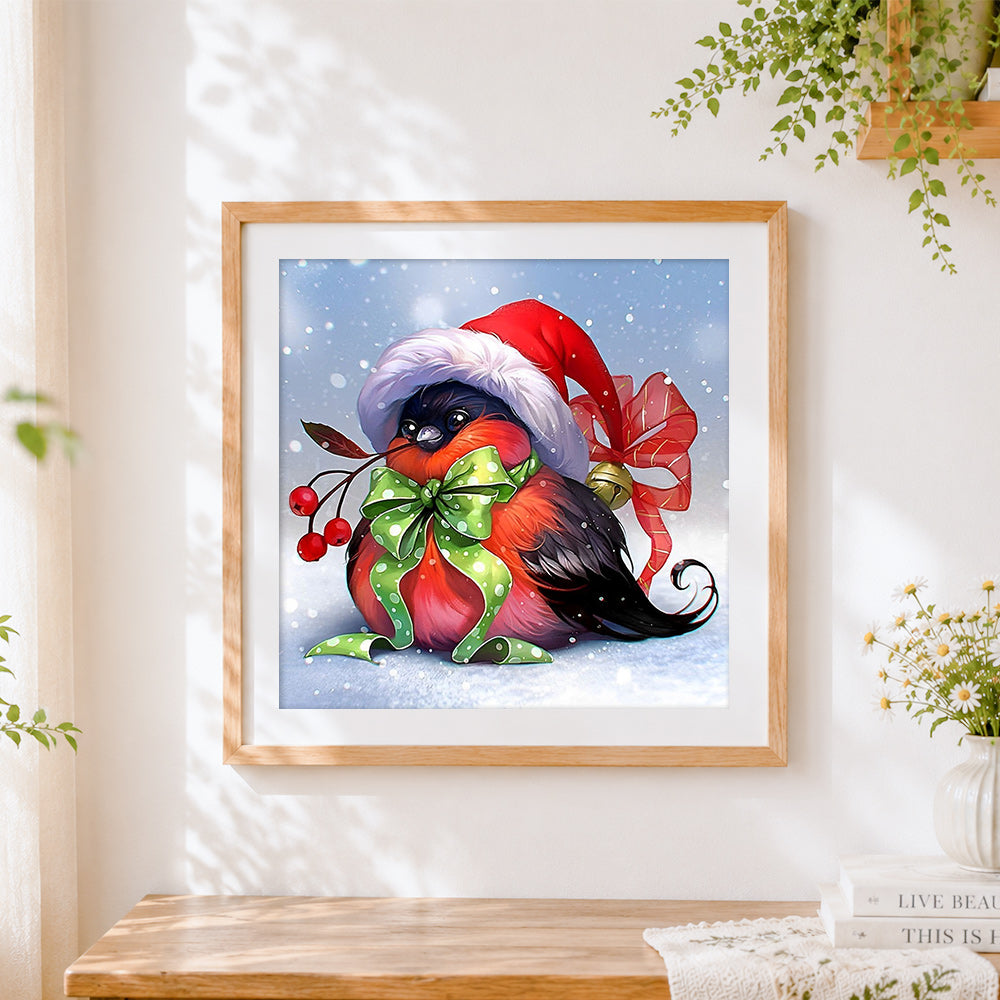 Finished cute robin with santa hat cross stitch artwork displayed