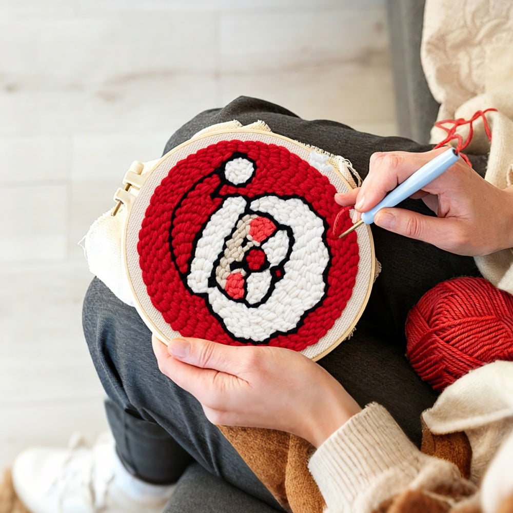 Creating handmade cute santa face unch needle artwork