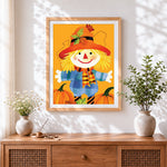 Finished cute scarecrow and pumpkins cross stitch artwork displayed