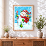 Finished cute snowman with candy cane cross stitch artwork displayed