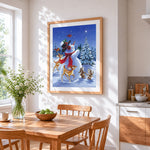 Cute snowman with deer, rabbits and cardinals cross stitch artwork displayed on wall as home decor