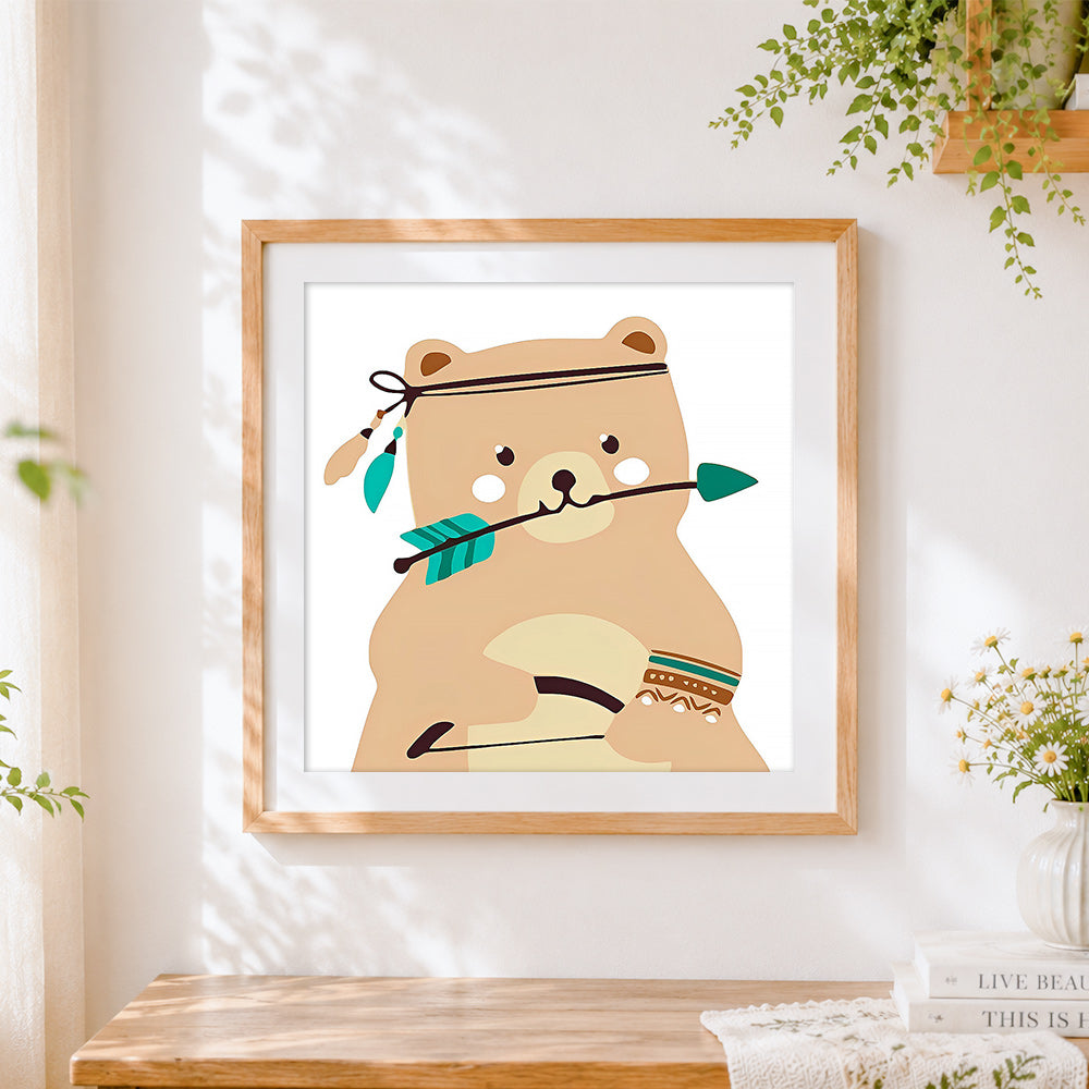 Finished cute tribal bear with arrow cross stitch artwork displayed