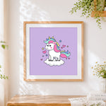 Finished cute unicorn on a cloud with hearts cross stitch artwork displayed