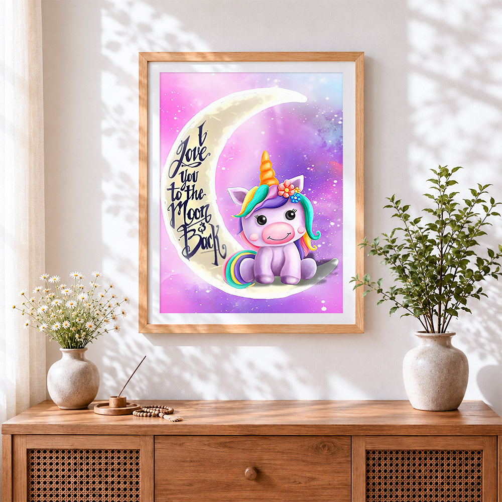 Finished cute unicorn on the moon cross stitch artwork displayed
