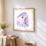 Cute unicorn with pink hair and flowers cross stitch artwork displayed on wall as home decor