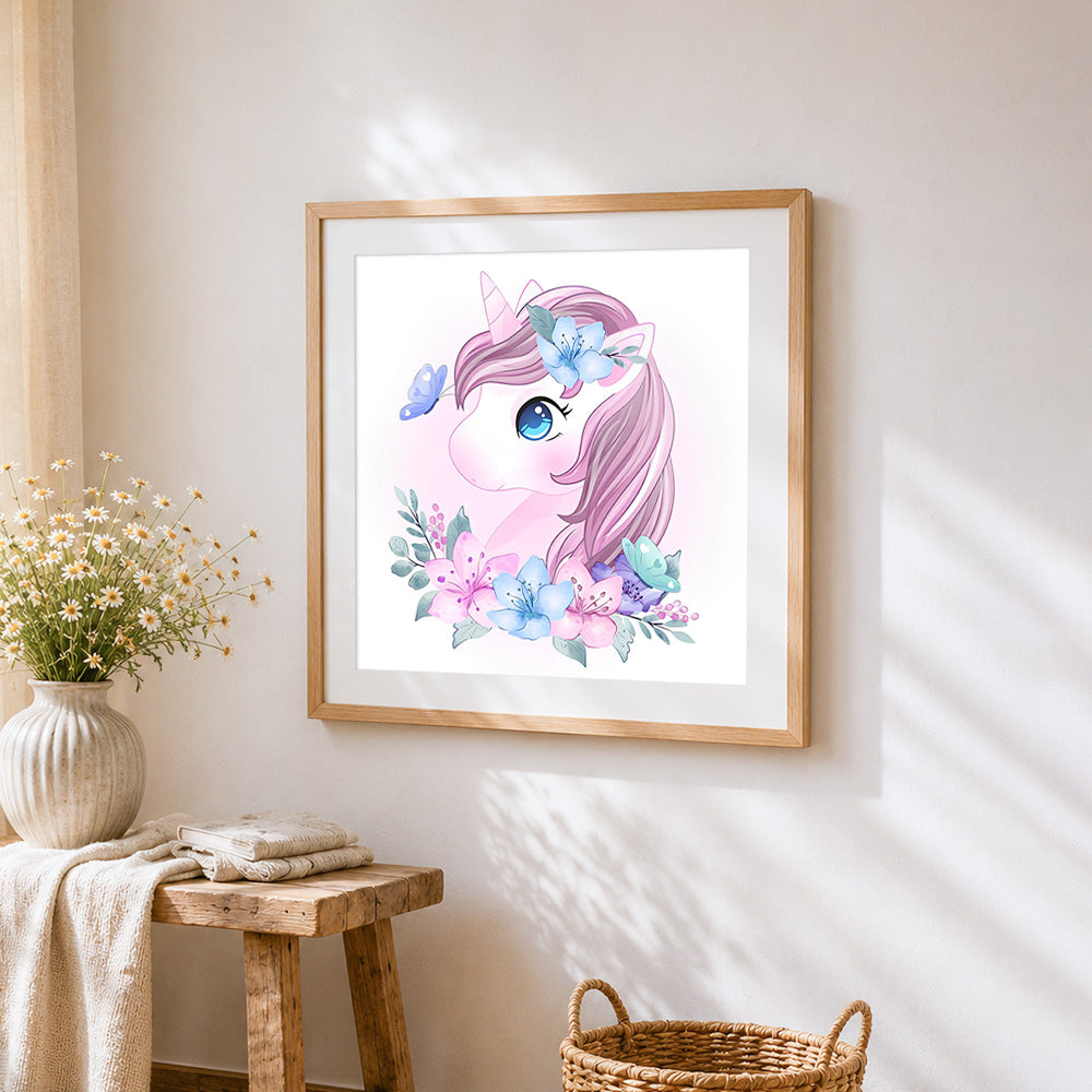 Cute unicorn with pink hair and flowers cross stitch artwork displayed on wall as home decor