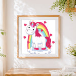Finished cute unicorn with rainbow and hearts cross stitch artwork displayed