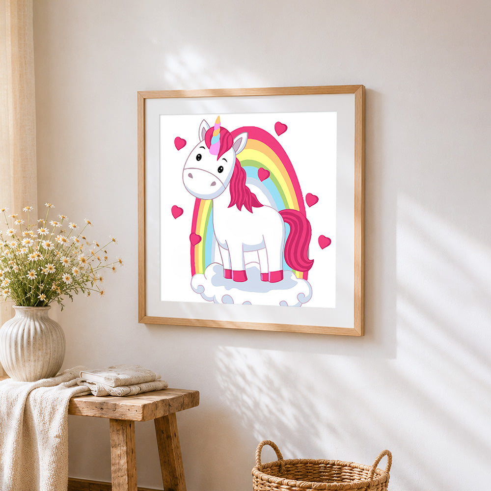 Cute unicorn with rainbow and hearts cross stitch artwork displayed on wall as home decor