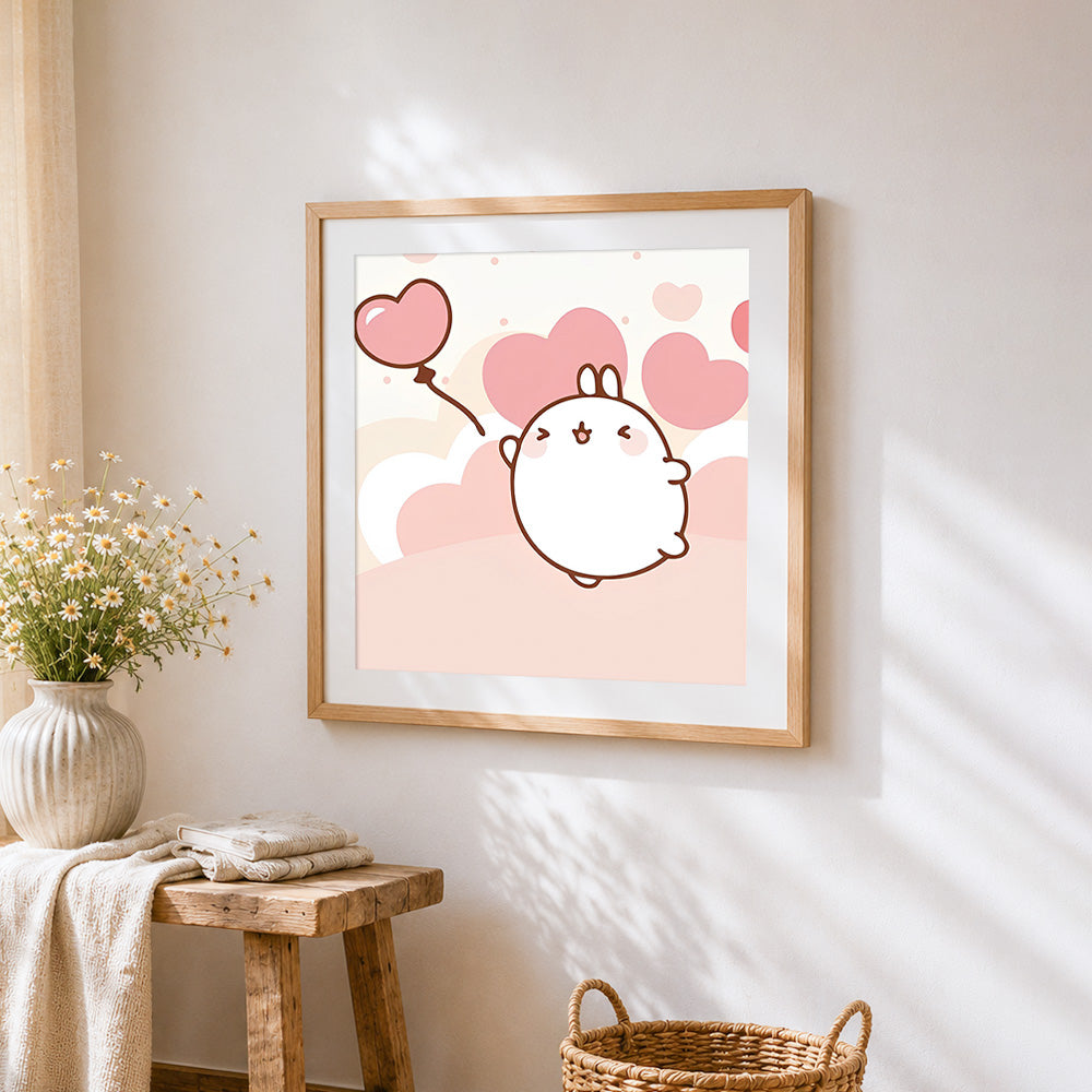 Cute white bunny with heart balloon cross stitch artwork displayed on wall as home decor