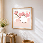 Cute white bunny with heart balloon cross stitch artwork displayed on wall as home decor