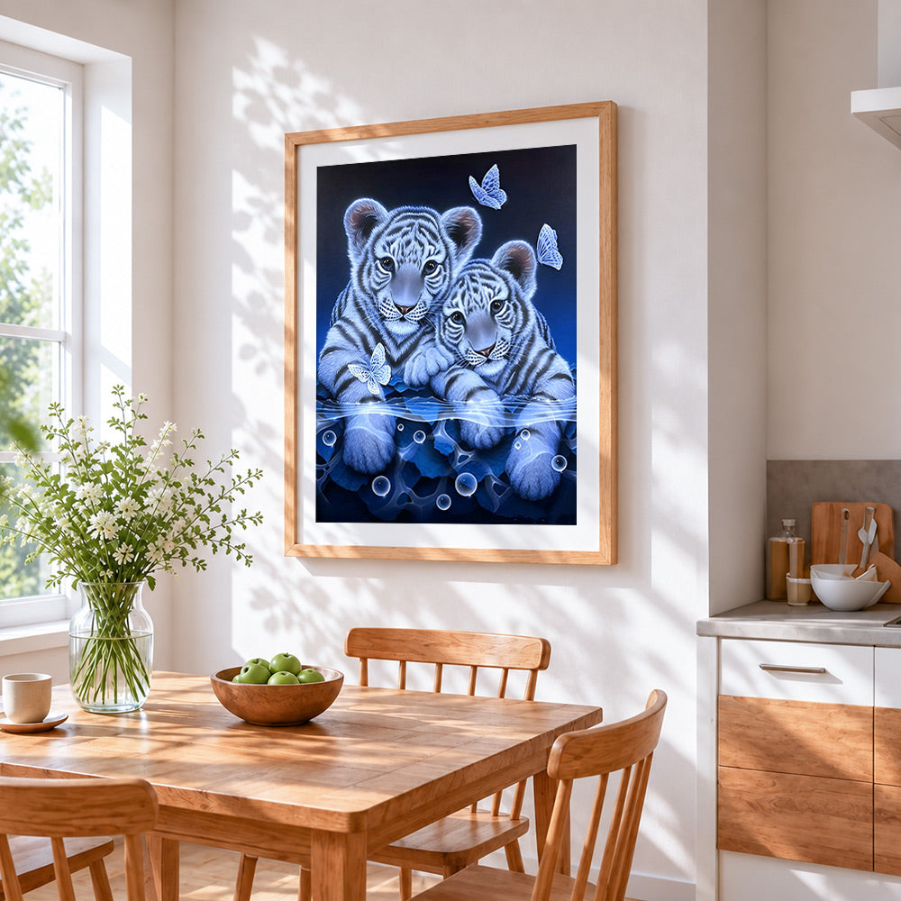 Cute white tiger cubs and butterflies cross stitch artwork displayed on wall as home decor