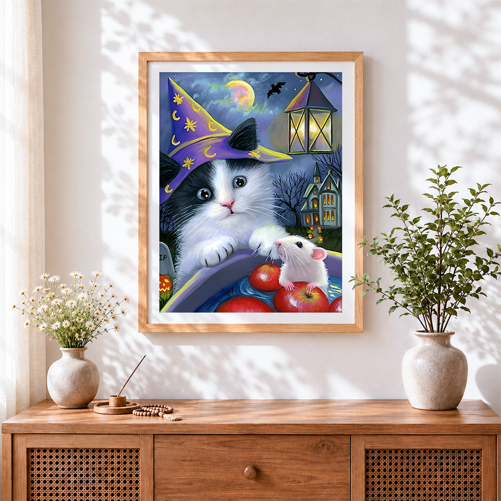 Finished cute witch cat with mouse cross stitch artwork displayed