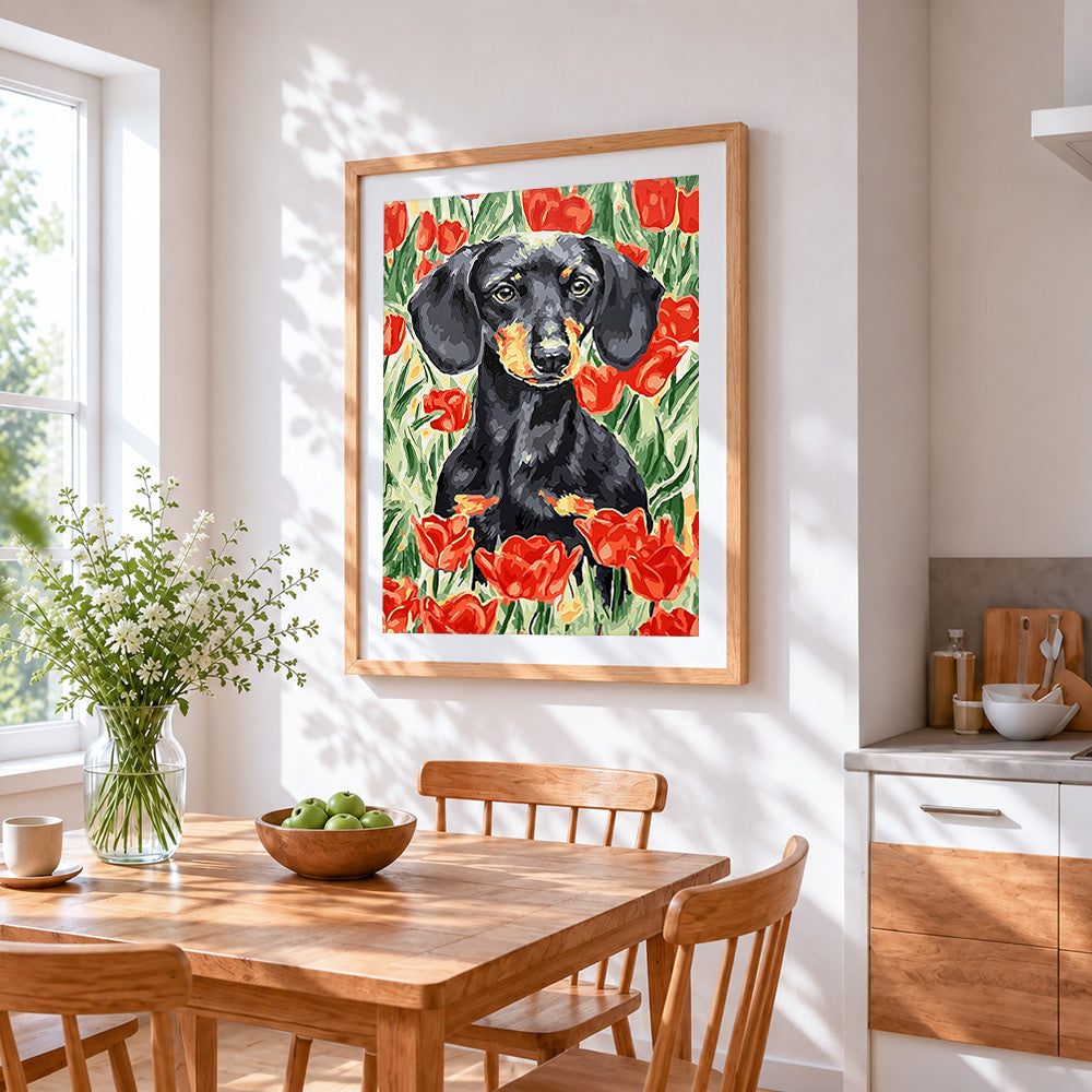 Dachshund among red tulips cross stitch artwork displayed on wall as home decor