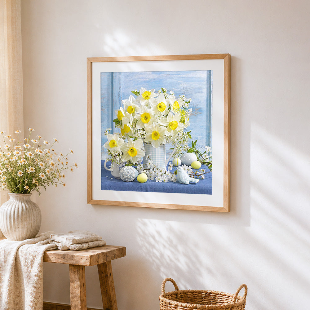 Daffodils and easter eggs cross stitch artwork displayed on wall as home decor
