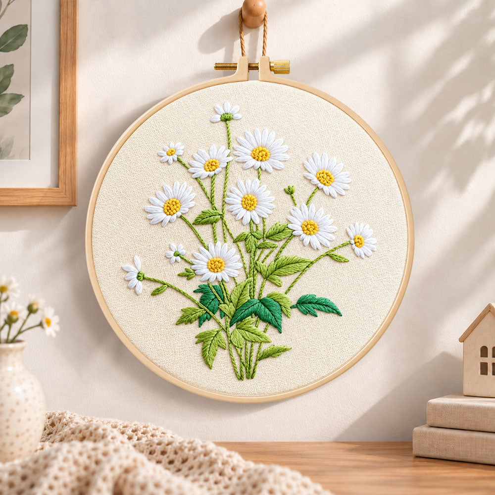 Daisies on beige background embroidery hoop wall art displayed as warm and cosy handmade home decor