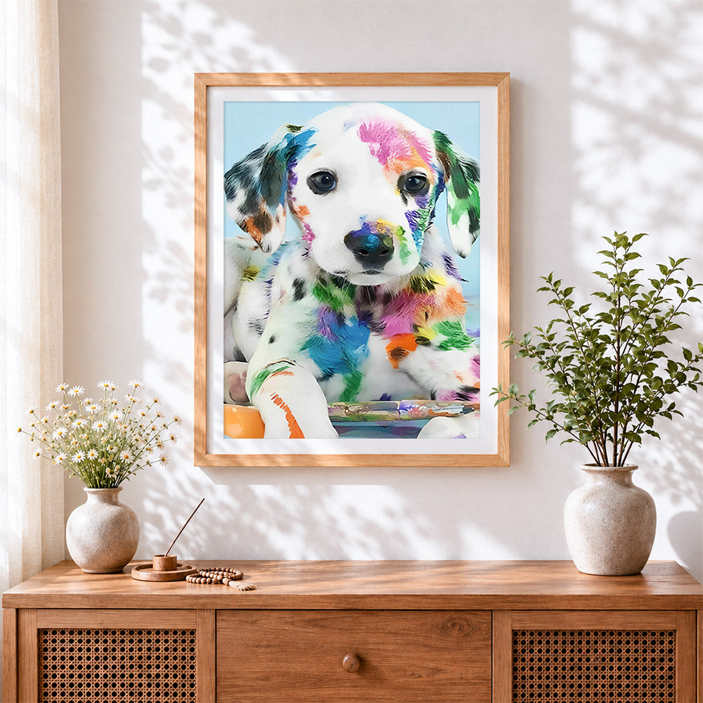 Finished dalmatian puppy covered in paint cross stitch artwork displayed