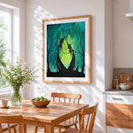 Dancing witches in a green forest cross stitch artwork displayed on wall as home decor