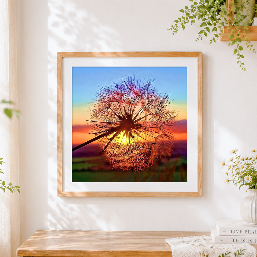 Finished dandelion seed at sunset cross stitch artwork displayed