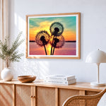 Dandelion silhouette at sunset cross stitch artwork displayed on wall as home decor