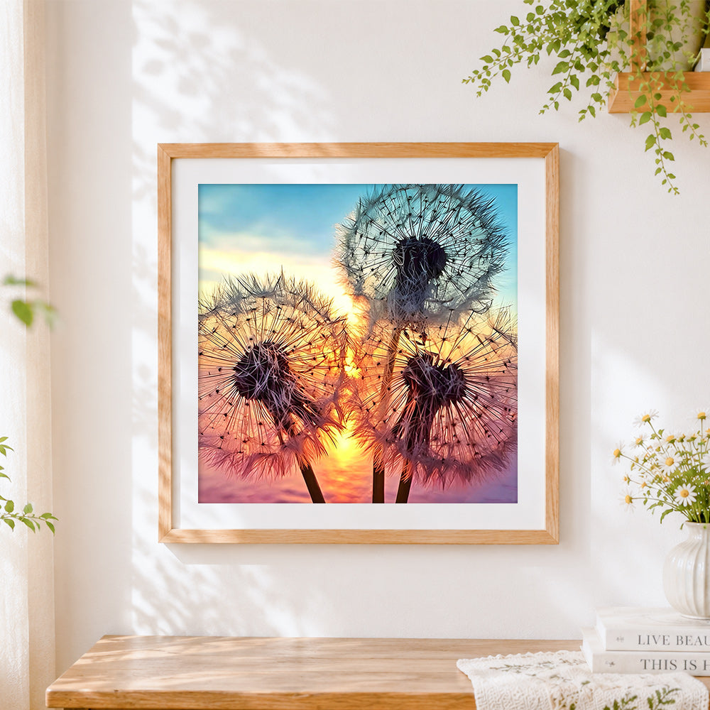 Finished dandelion silhouettes at sunset cross stitch artwork displayed