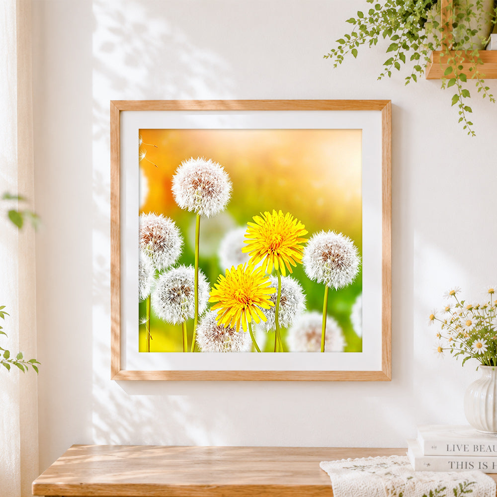 Finished dandelions and yellow flowers cross stitch artwork displayed