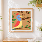 Finished "dare to be different" parrot cross stitch artwork displayed