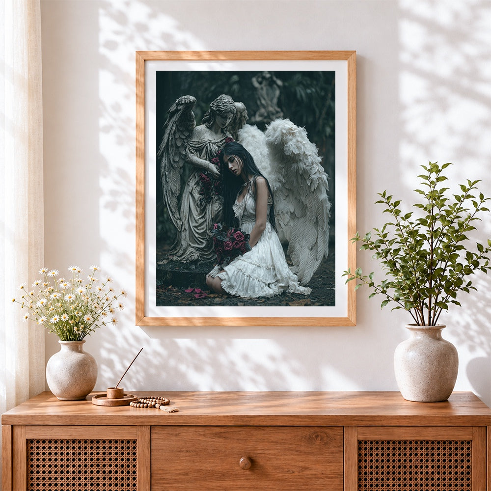 Finished dark angel with stone statue and roses cross stitch artwork displayed