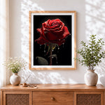 Finished dark red rose with water droplets cross stitch artwork displayed