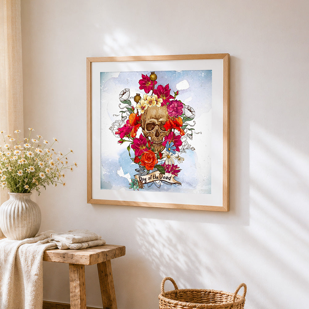 Day of the dead skull and flowers cross stitch artwork displayed on wall as home decor