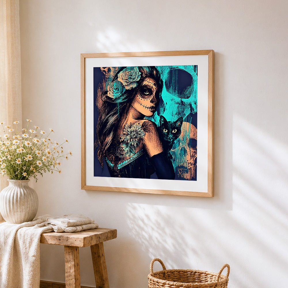 Day of the dead woman with black cat cross stitch artwork displayed on wall as home decor