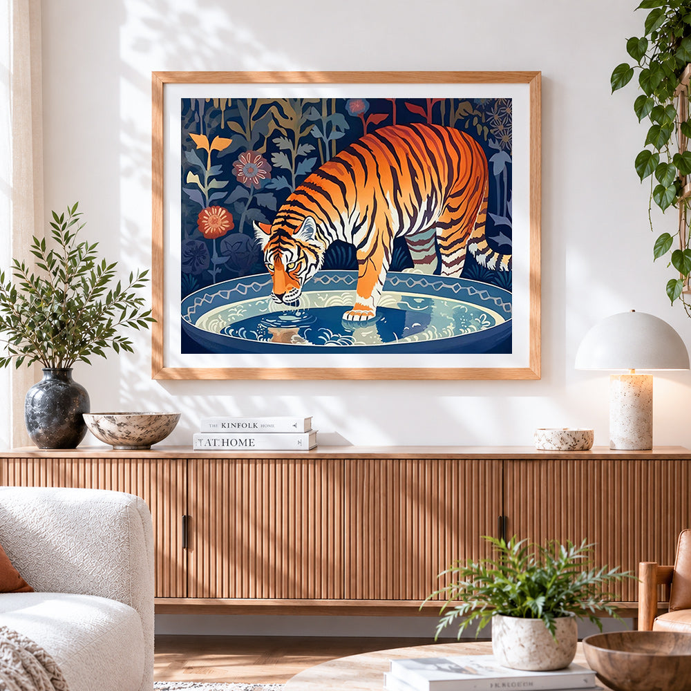 Finished decorative tiger drinking water cross stitch artwork displayed
