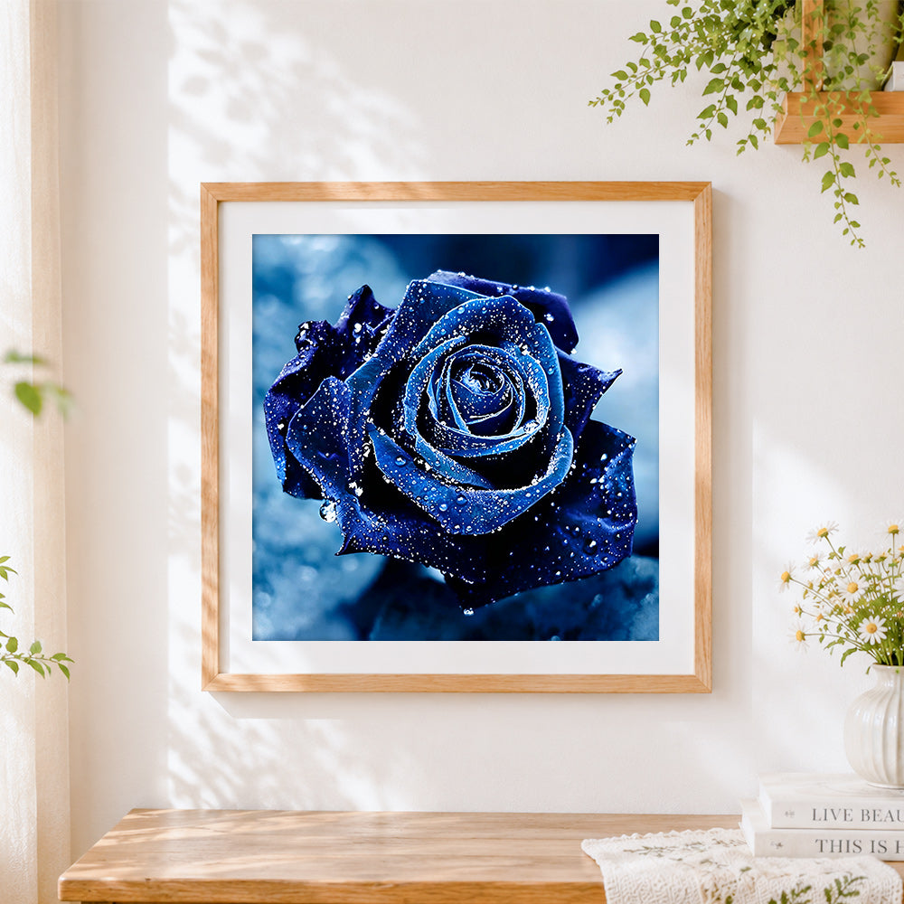 Finished deep blue rose with water droplets paint by numbers artwork displayed as home decor