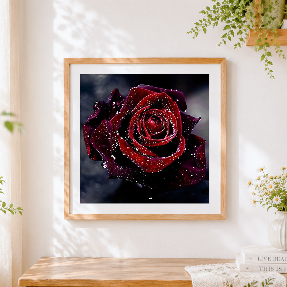 Finished deep red rose with water droplets paint by numbers artwork displayed as home decor