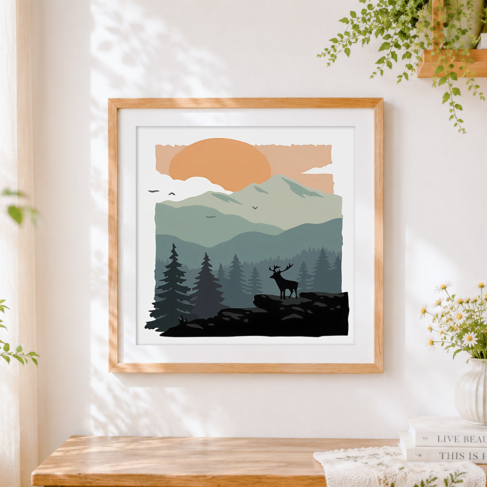 Finished deer in forest with mountains cross stitch artwork displayed