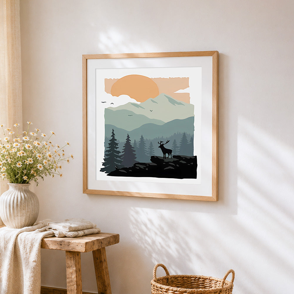 Deer in forest with mountains cross stitch artwork displayed on wall as home decor