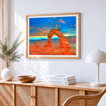 Delicate arch utah cross stitch artwork displayed on wall as home decor