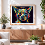 Finished dog with headphones and red glasses cross stitch artwork displayed