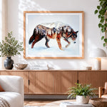Finished double exposure wolf and mountain cross stitch artwork displayed