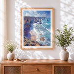 Finished dramatic coastal sea stacks and cliffs cross stitch artwork displayed