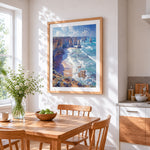 Dramatic coastal sea stacks and cliffs cross stitch artwork displayed on wall as home decor