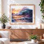 Finished dramatic ocean wave at sunset cross stitch artwork displayed