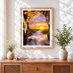 Finished dramatic sea cave sunset cross stitch artwork displayed